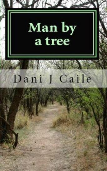 Man by a tree
