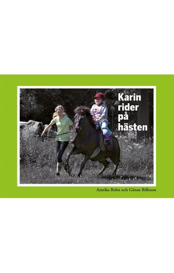 Karin rider på hästen