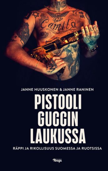 Pistooli Guccin laukussa
